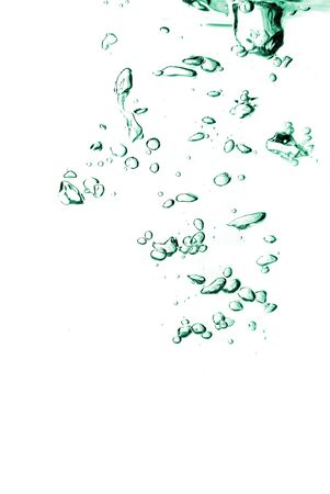 bubbles in a green water close upの写真素材