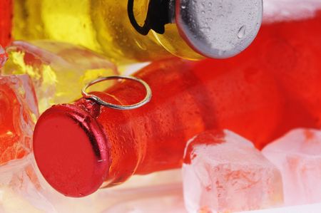 bottles with  tasty drink in iceの写真素材