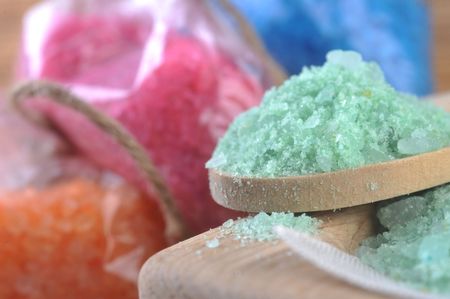 Pink, white,  blue, green and orange salt for  bath  isolatedの写真素材