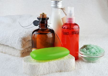 different cosmetics for body and  towel on  whiteの写真素材