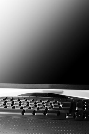  monitor and  black keyboard  isolated on white close upの写真素材