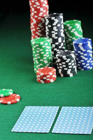 different color chips for gamblings and playing cards on green
のeditorial素材