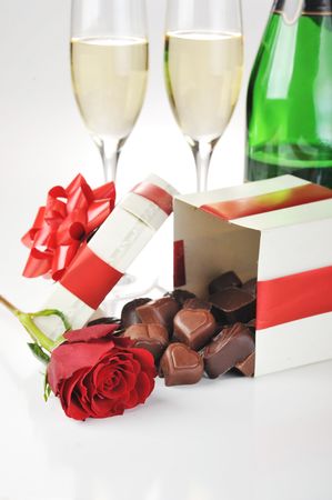 beautiful red rose, champagne  and chocolate  close upの写真素材