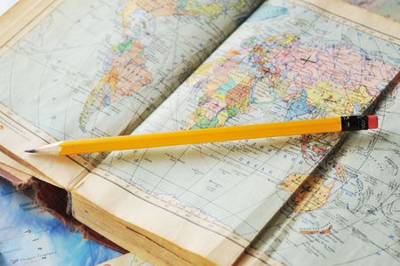 opened old atlas book on  mapの写真素材
