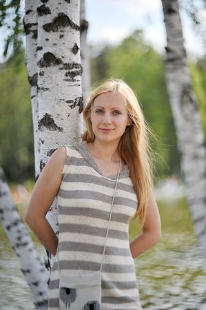  beautiful young woman in park  portraitの写真素材