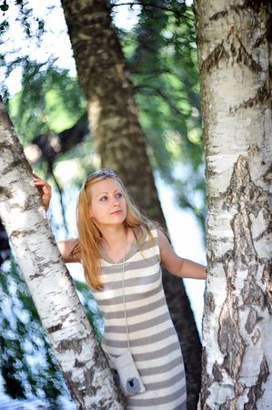  beautiful young woman in park  portraitの写真素材