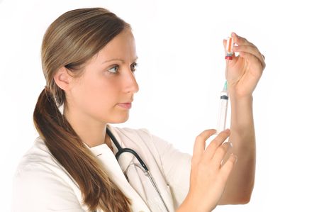 woman doctor with syringe getting vaccine  from ampouleの写真素材