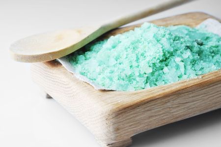 Green sea salt for bathing  isolated on  wooden tray   の写真素材