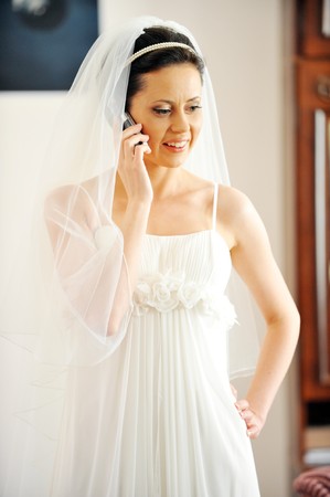  beautiful stylish bride speaks on  phoneの写真素材