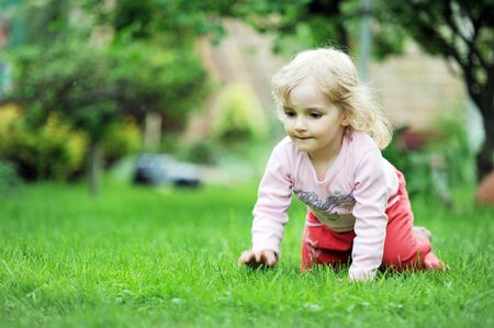 little girl  playing in parkの写真素材