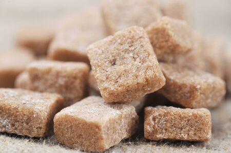 cane sugar on brown sacking close upの写真素材
