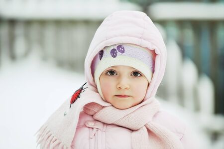 little girl in winter parka. portraitの写真素材