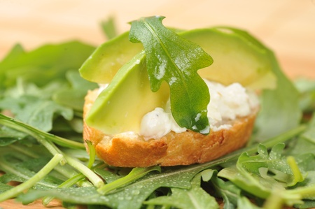 delicious sandwich of toasted bread, avocado and spinach の写真素材