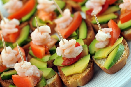 sandwiches  garnish with shrimps, avokado and lettuce close up, snackの写真素材