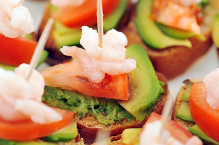 sandwiches  garnish with shrimps, avokado and lettuce close up, snackの写真素材