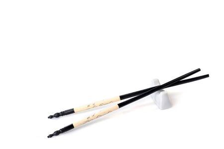 asian chopsticsk isolated  on white close upの写真素材