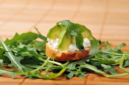 delicious sandwich of toasted bread, avocado and spinach の写真素材