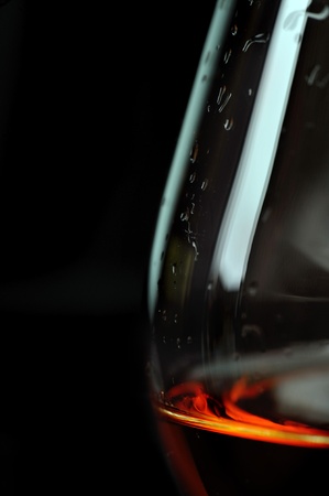  snifter of  brandy in  elegant  glass.  black backgroundの写真素材