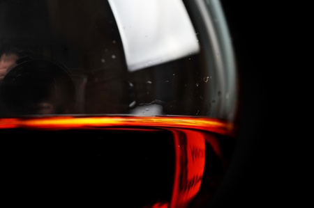  snifter of  brandy in  elegant  glass.  black backgroundの写真素材