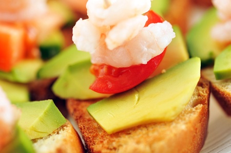 sandwiches  garnish with shrimps, avokado and lettuce close up, snackの写真素材