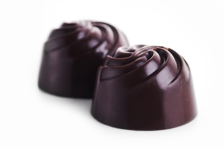 Tasty chocolates isolated on whiteの写真素材
