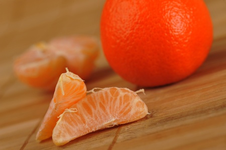 delicious juicy tangerine  on  bamboo napkin close upの写真素材