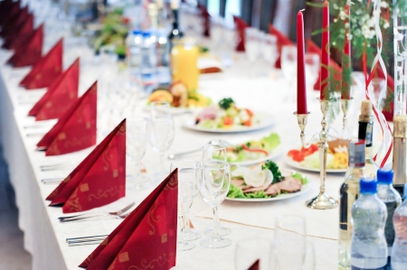 Wedding  reception place ready for guests.  table with food and drinkの写真素材