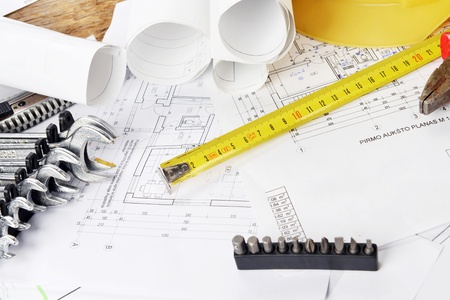 heap of design and project drawings on table background.の写真素材