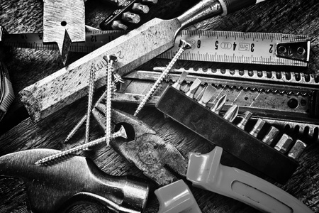 Set of different tools on wooden backgroundの写真素材