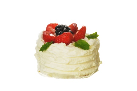 tasty cake with white icing and strawberries isolatedの写真素材