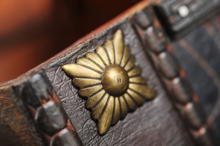 Part leather chest with  metal ornament, close upの写真素材