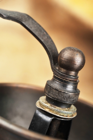 Vintage Manual coffee grinder with coffee beans isolated の写真素材
