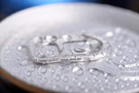  wet aluminium can with drink, close-up of top