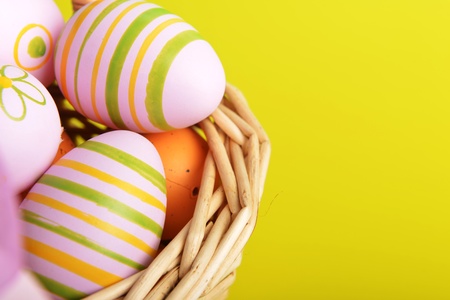 basket wicker with decoration easter eggsの写真素材