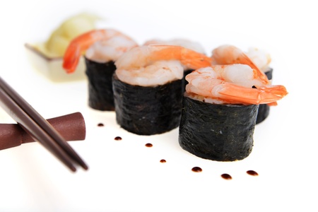  fresh sushi rolls and drop of sauce on  tableの写真素材