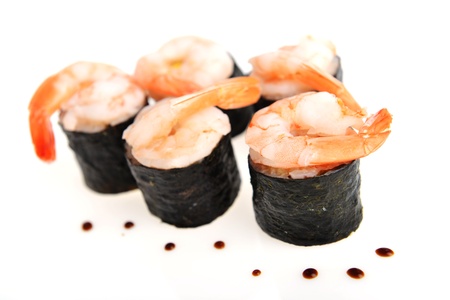  fresh sushi rolls and drop of sauce on  tableの写真素材