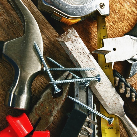 Set of different tools on wooden backgroundの写真素材