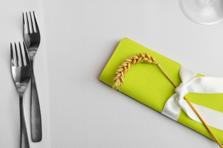 Wedding reception place ready for guests. Detail of wedding dinner settingの写真素材