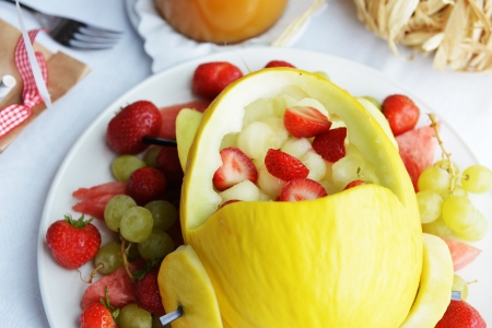 composition of strawberries, grapes and melonの写真素材