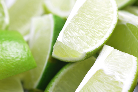 pile slices of fresh ripe fruit lime の写真素材