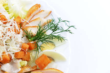 meat salad with croutons, cheese and boiled eggの写真素材