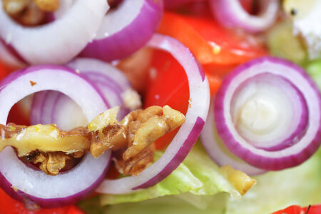 salad with feta cheese and fresh vegetables の写真素材