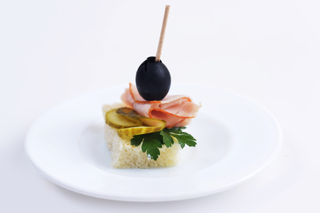 sandwiches with slices meat on wooden chopsticksの写真素材