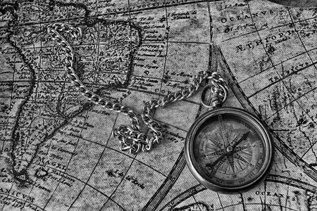 Vintage compass on old map 