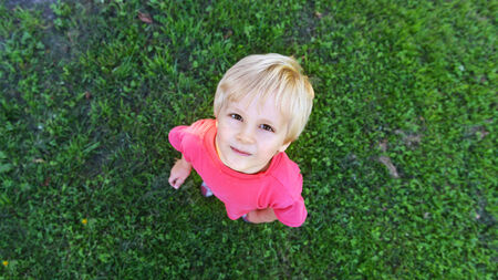 little boy playing in parkの写真素材