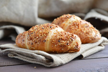 fresh baked buns on tableの写真素材