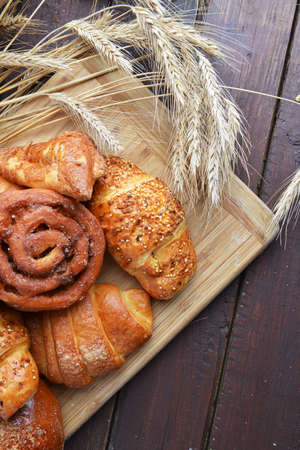 fresh baked buns on tableの写真素材