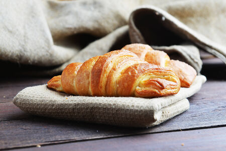 fresh baked buns on tableの写真素材