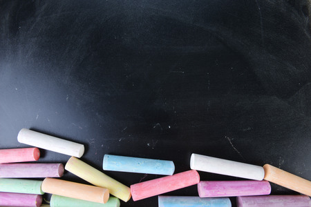 collection of colorful chalks on black backgroundの写真素材