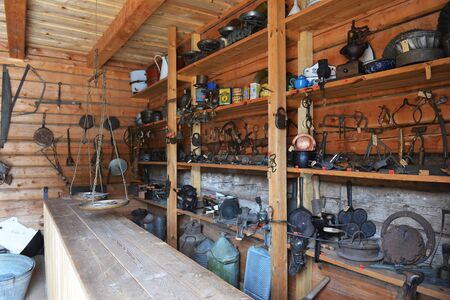 rural work tools, hung on  walls of  barnのeditorial素材